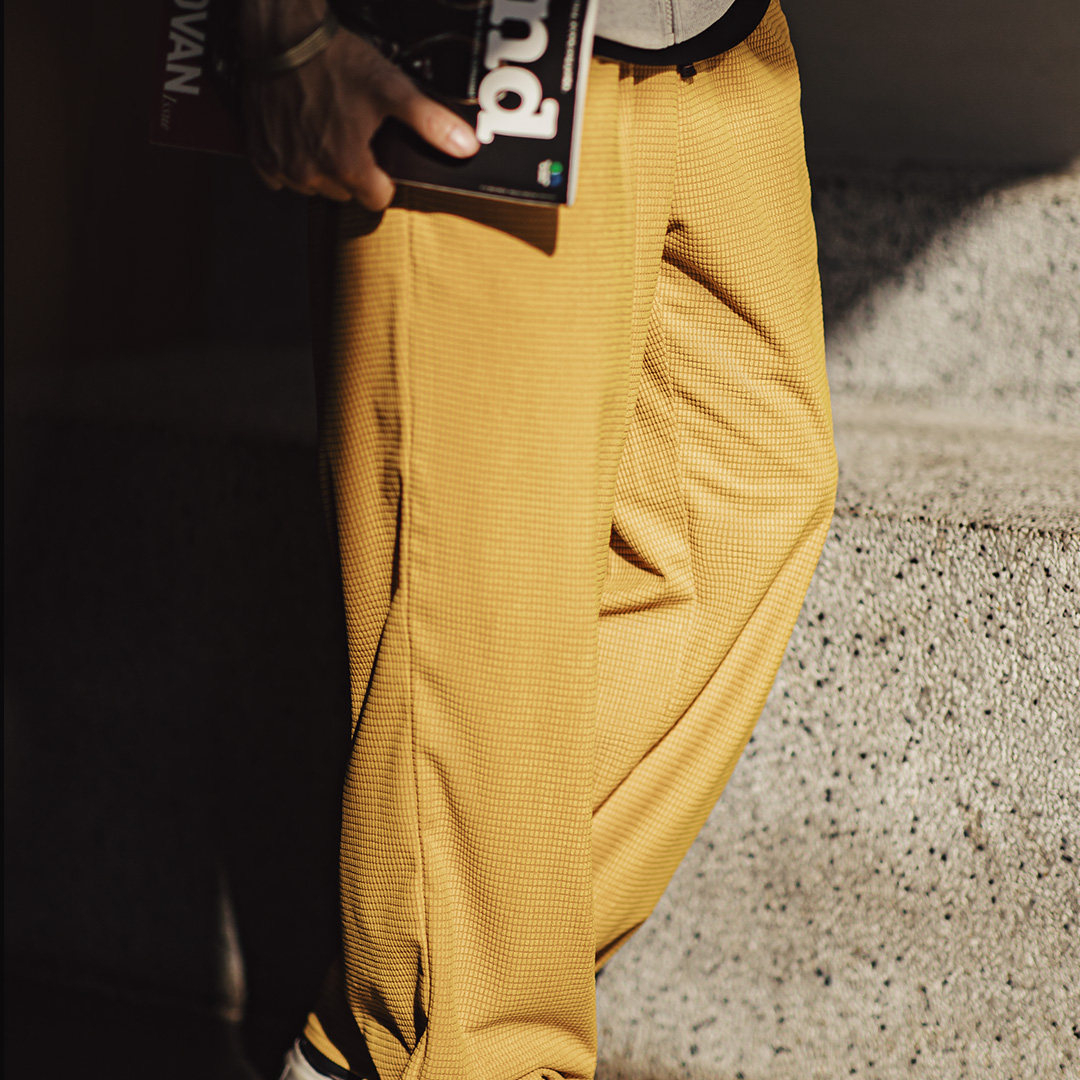 美式方格黃色玉米絨休閒褲直筒抽繩束腳寬鬆長褲子男款春