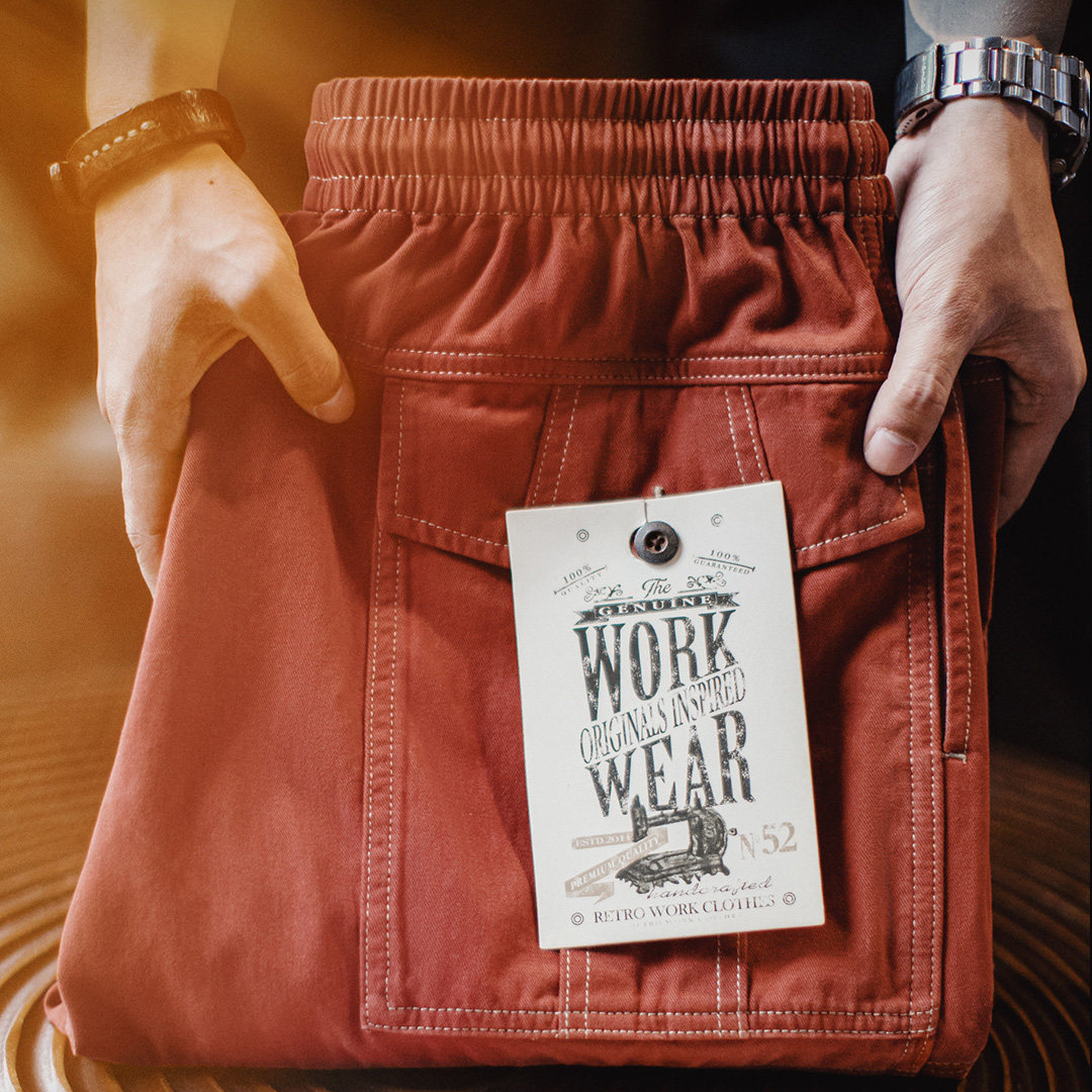 美式復古多口袋明線工裝褲磚紅色直筒闊腿束腳休閒褲男春