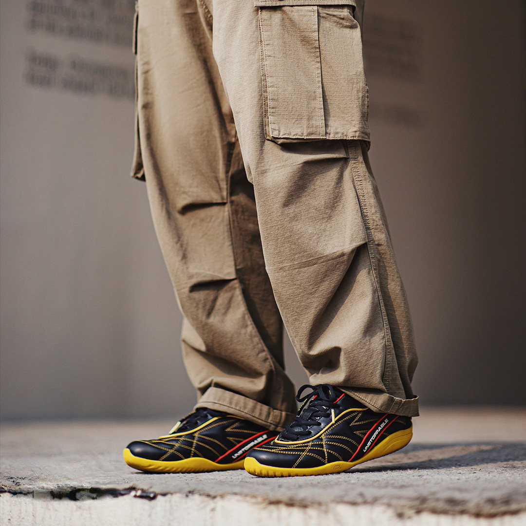 復古足球德訓鞋男春季新款翻蓋皮面黑黃色鞋子平底運動休閒鞋