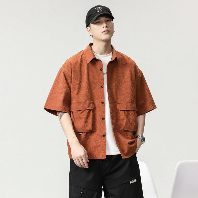 高級感短袖襯衫男夏季新款輕奢潮牌美式工裝寸襯衣男寬松半袖