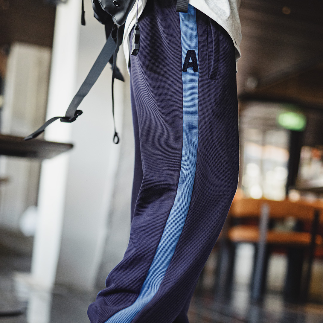 美式休閒訓練衛褲運動華夫格束腳褲鬆緊腰藍色長褲子男秋