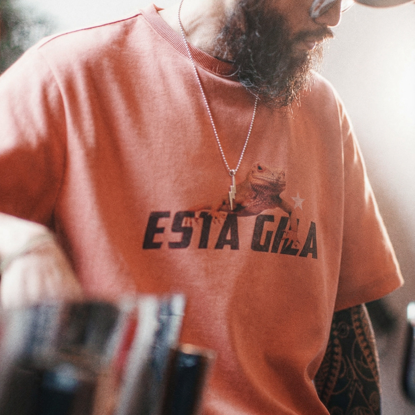 美式復古印花短袖上衣圓領落肩落日橘紅色針織T恤男夏季