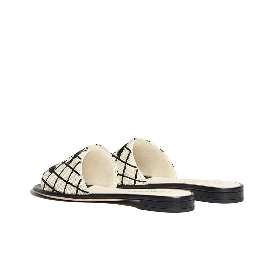 CHANEL slippers for women black and white