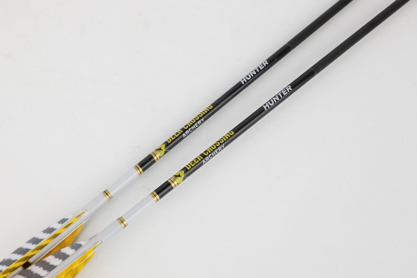 Deer Crossing Pure Carbon Arrow – 2 Yellow 1 White 4" Shield Striped Feather Fletching (12pcs)