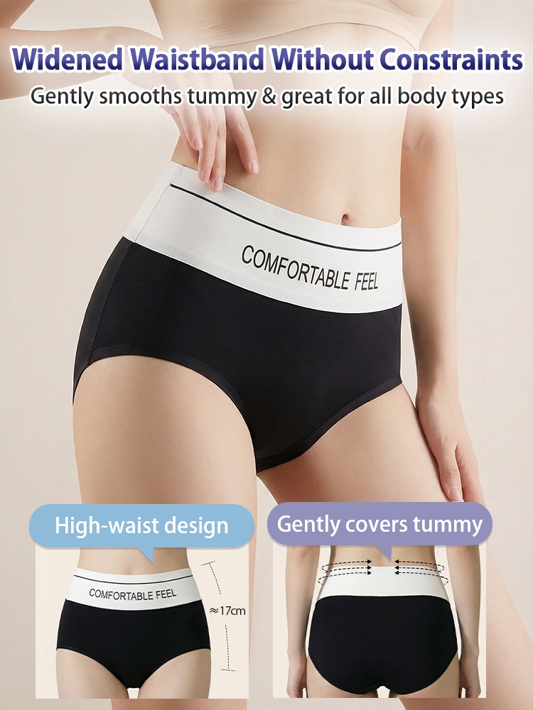 Black high-waist seamless panties on model showing widened waistband and tummy coverage VEIMIA