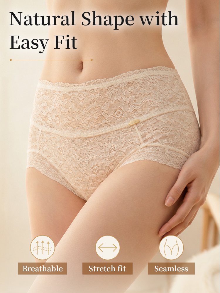 Model wearing beige high waist lace panties in angled front view VEIMIA