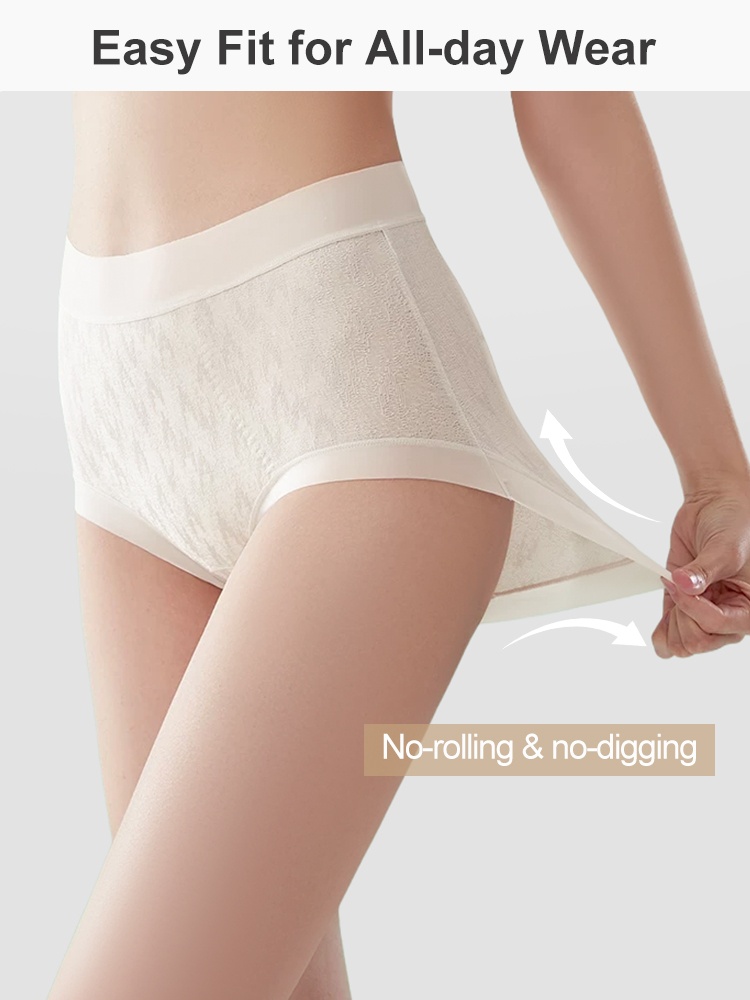 Side view of model stretching ivory panty leg opening for flexible fit VEIMIA