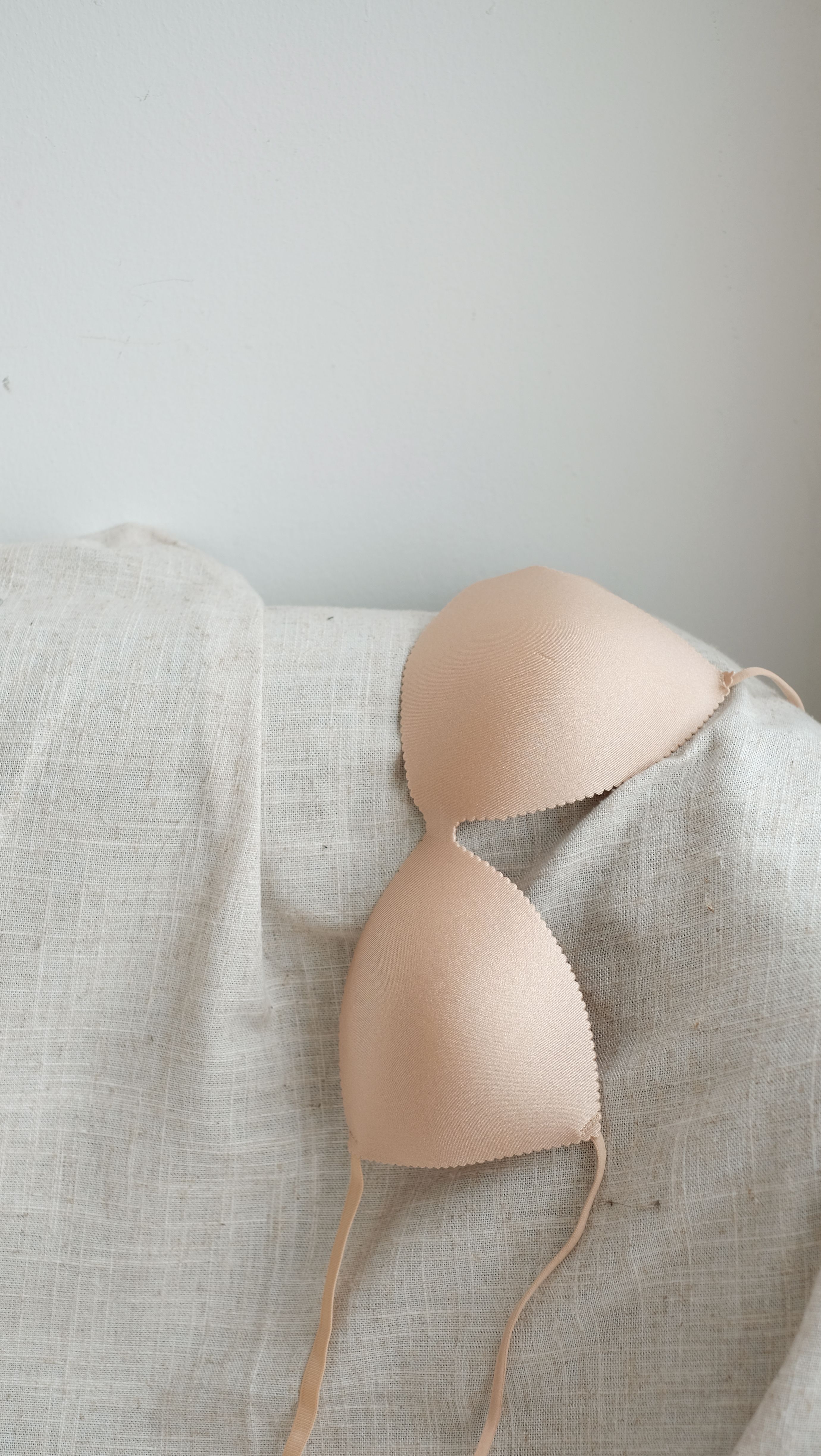 VEIMIA soft neutral bra flat lay illustrating comfort-first post mastectomy bra features