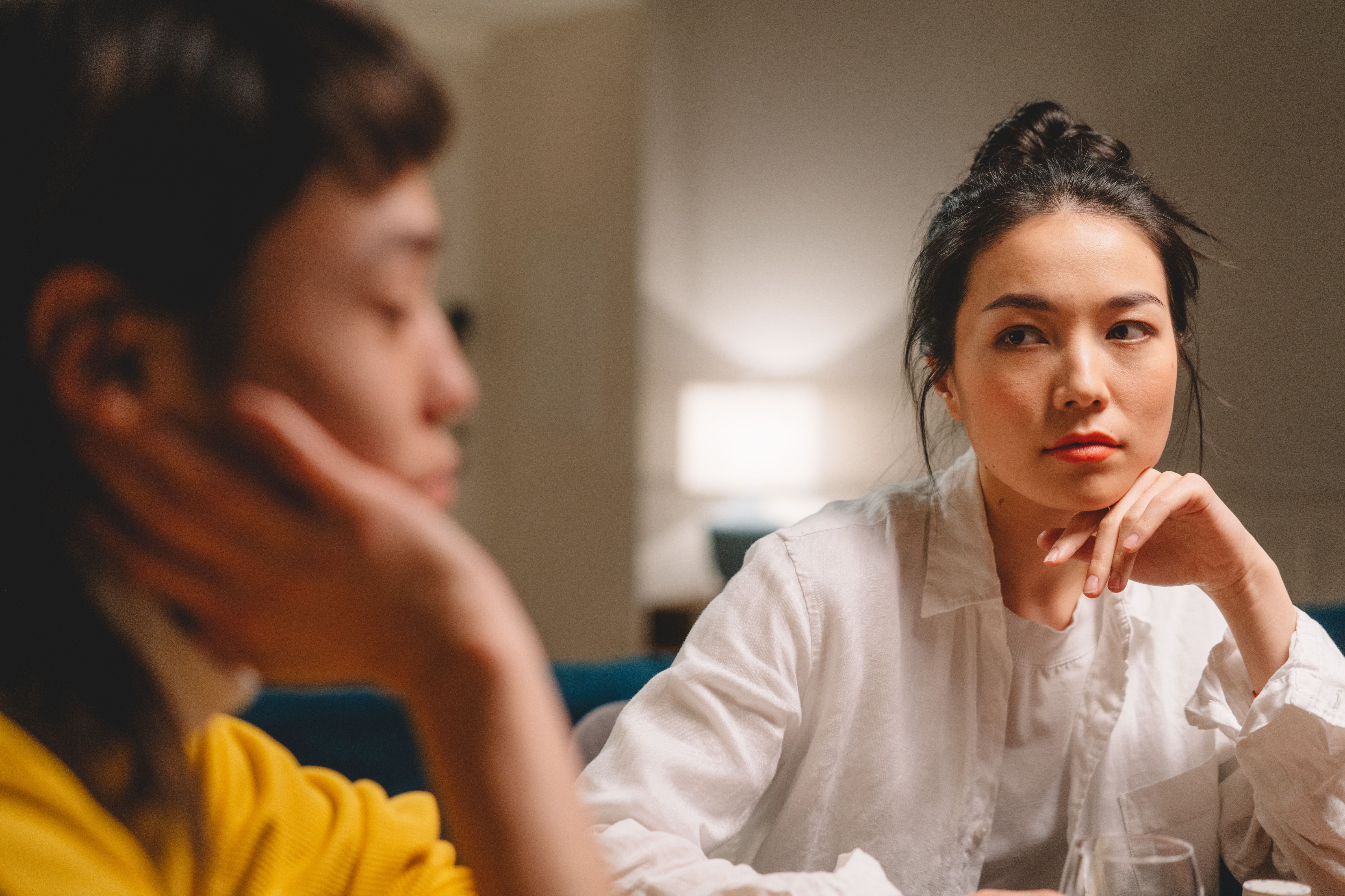 VEIMIA editorial photograph representing supportive conversation after breast cancer surgery