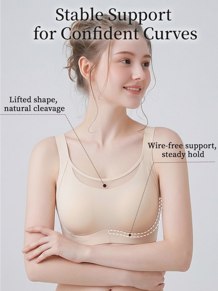Model wearing beige wireless bra with stable support and lifted bust shape VEIMIA