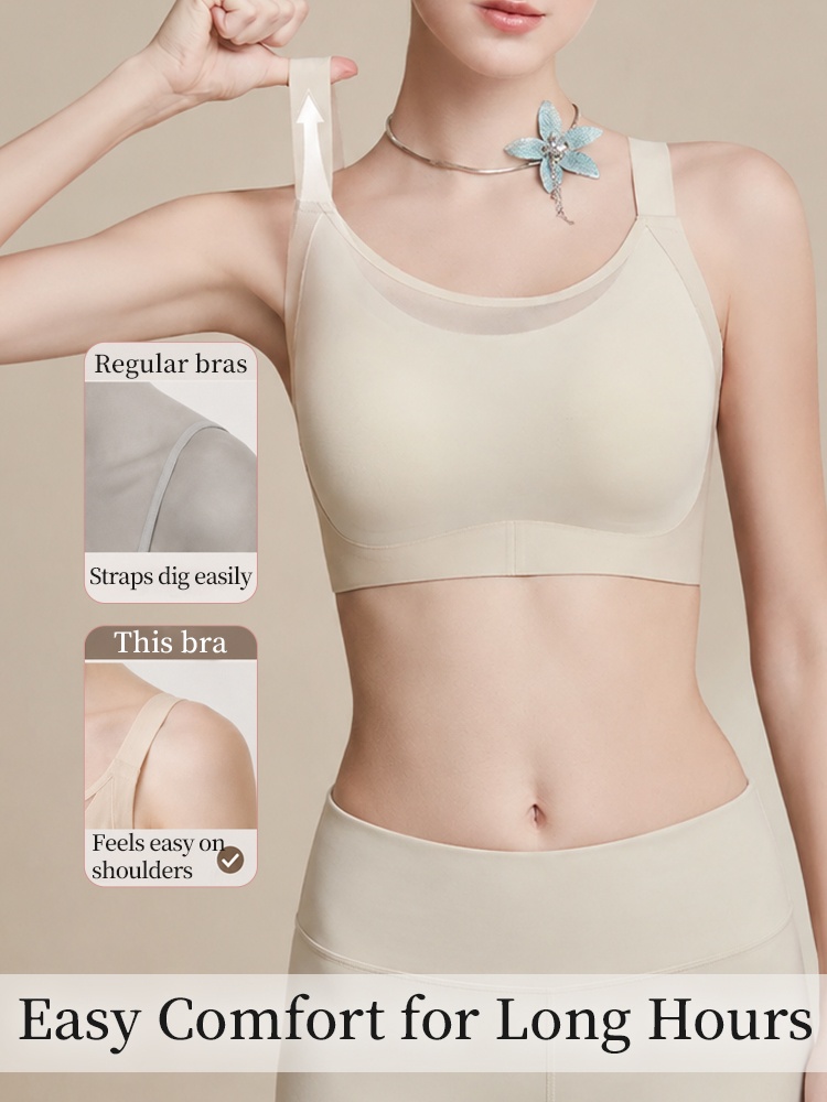 Model wearing beige bra while stretching wide shoulder strap for comfort comparison VEIMIA