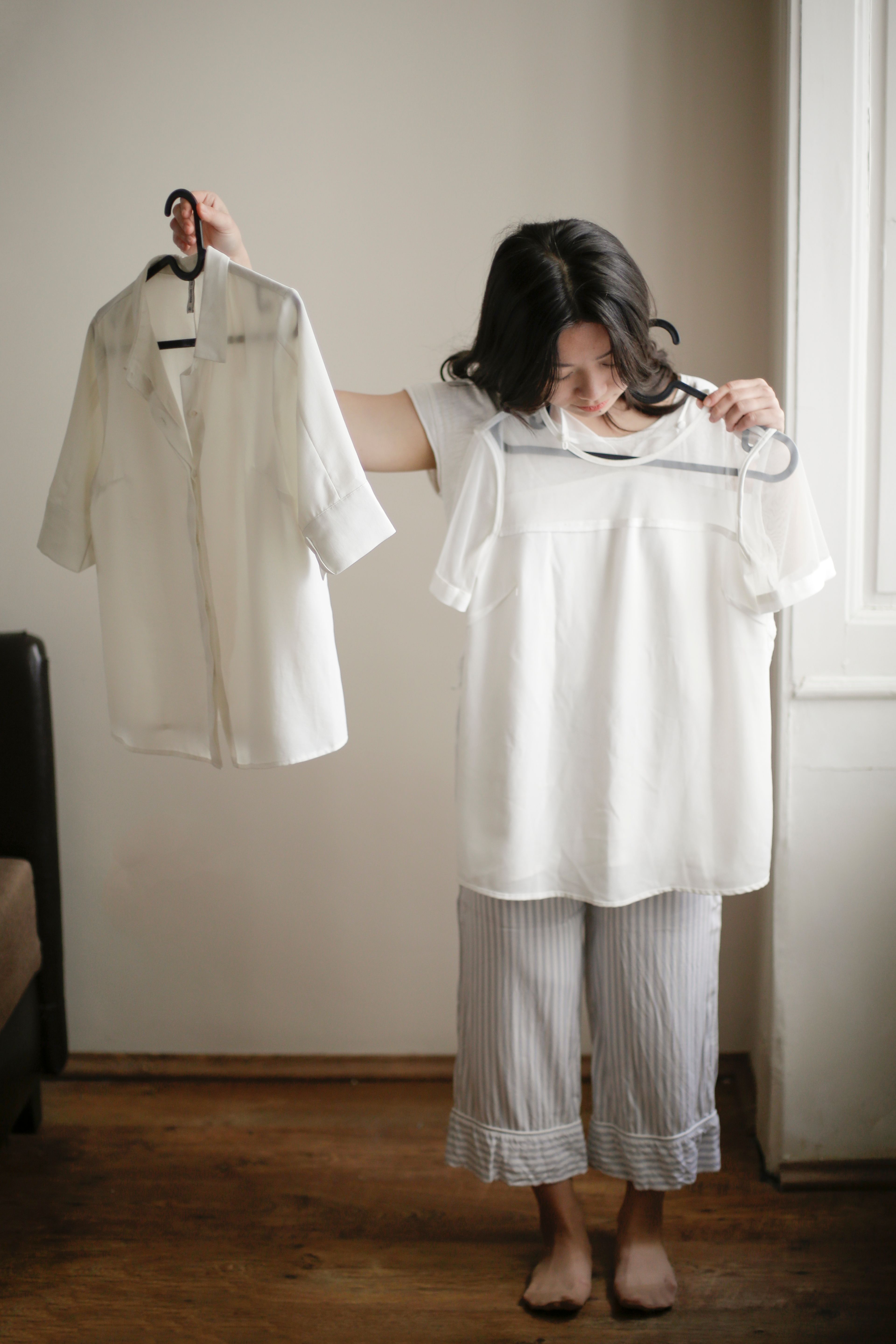 VEIMIA woman choosing clothes while considering comfort and personal style after mastectomy