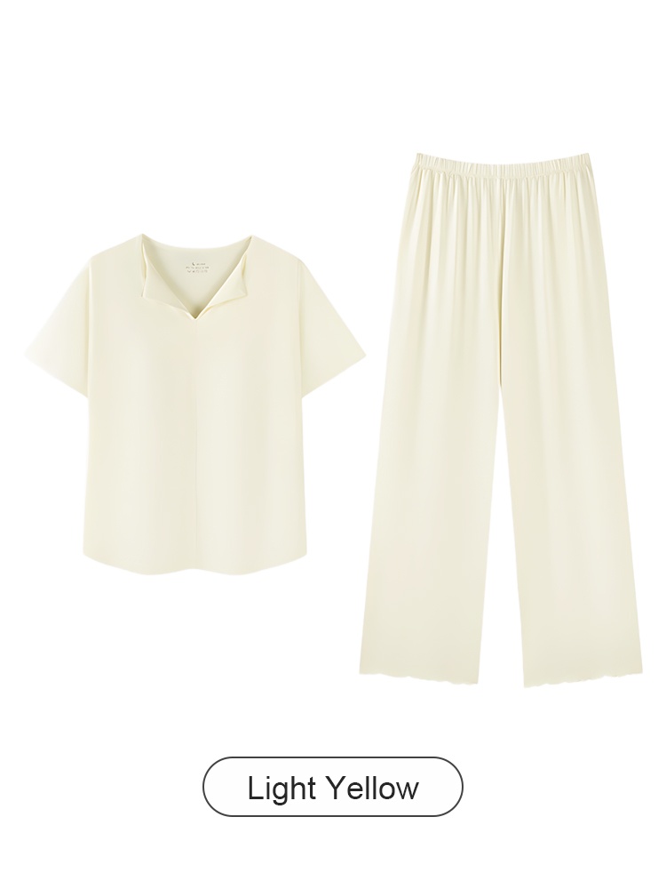 Flat lay of the light yellow short-sleeve pajama top and wide-leg pants set - VEIMIA