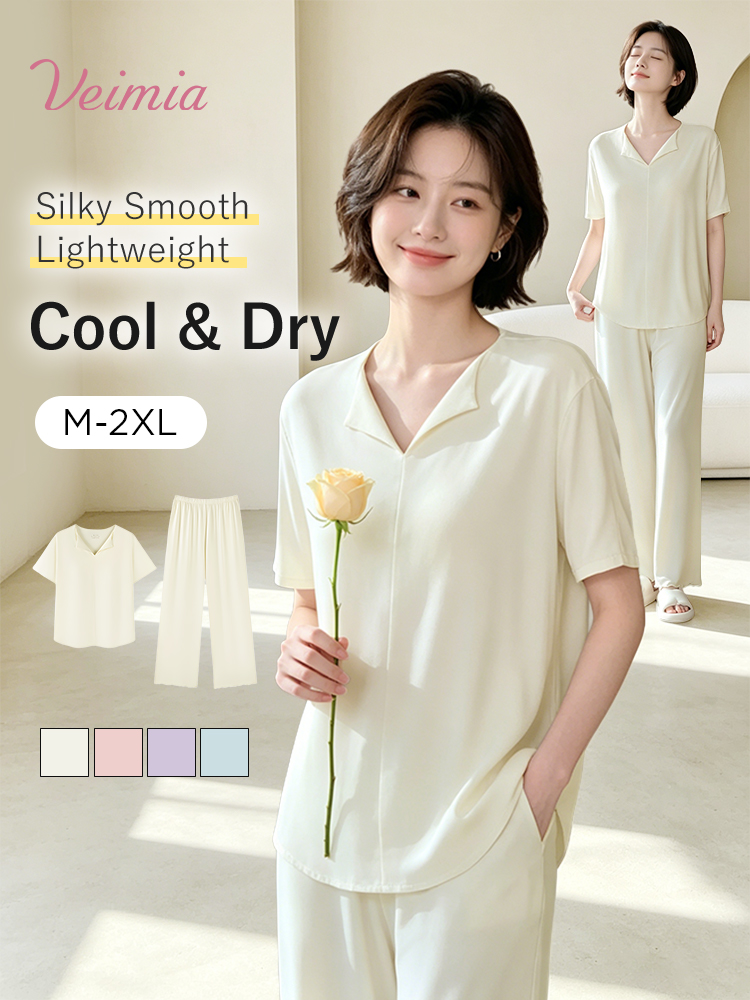 Model wearing a light yellow built-in padding pajama set with short-sleeve top and wide-leg pants - VEIMIA