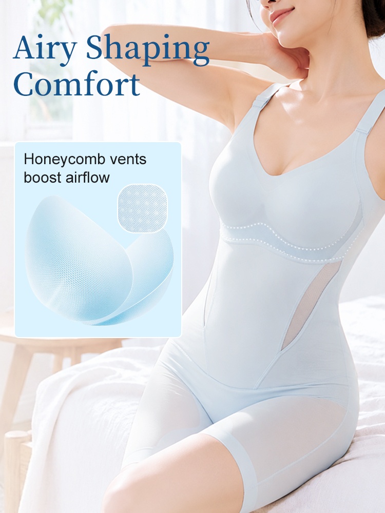 Model wearing light blue shaping bodysuit with ventilated cup detail VEIMIA