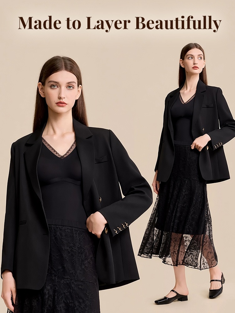 Two model views wearing black shaping top under blazer with dark lace skirt VEIMIA