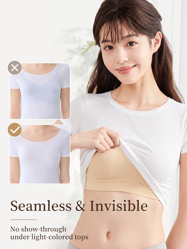 Model demonstrating smooth sand bra fit under a light-colored T-shirt VEIMIA