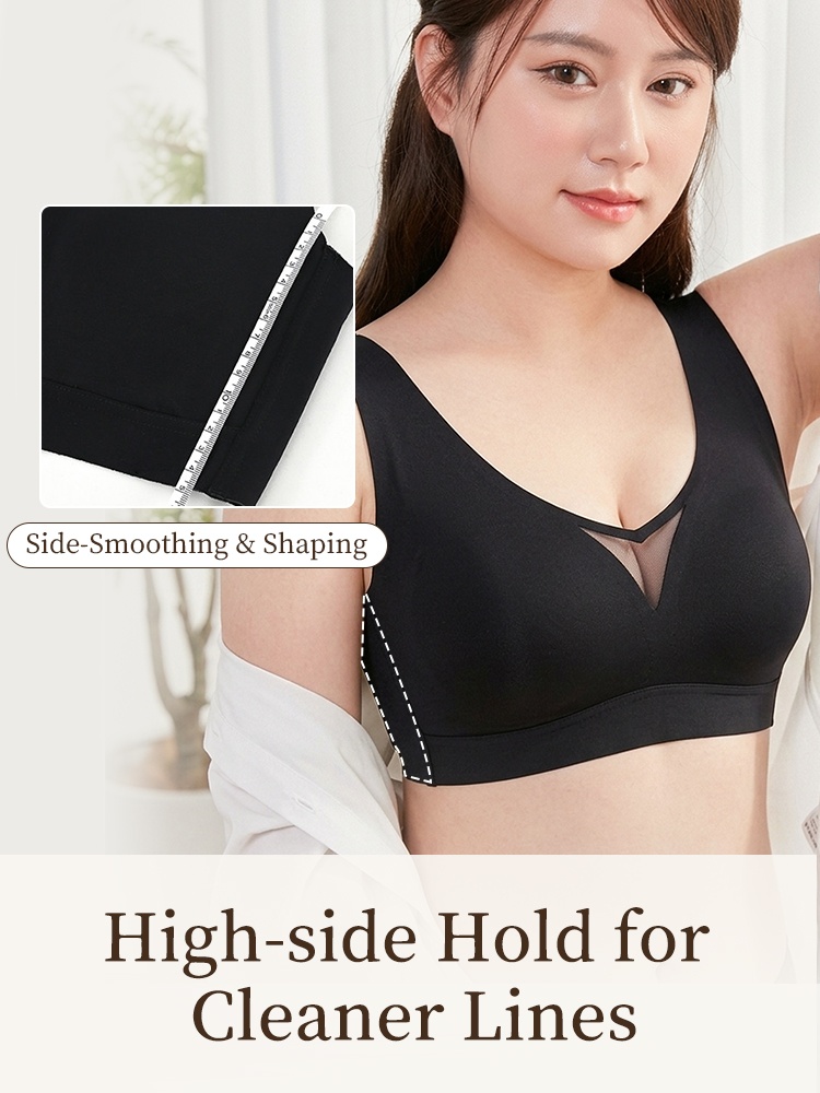 Model wearing black V-neck bra with high side coverage and smoothing panel VEIMIA