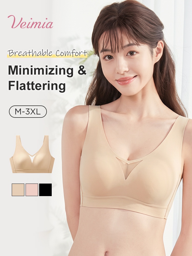 Model wearing sand V-neck minimizer bra with mesh center panel VEIMIA