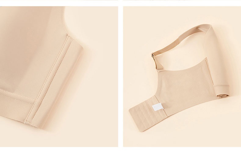 Detail view of vertical side strip and wide back wing on sand bra VEIMIA