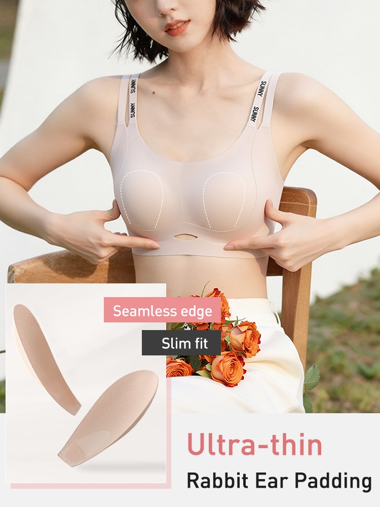 Model wearing a beige bra with ultra-thin padding insert detail VEIMIA