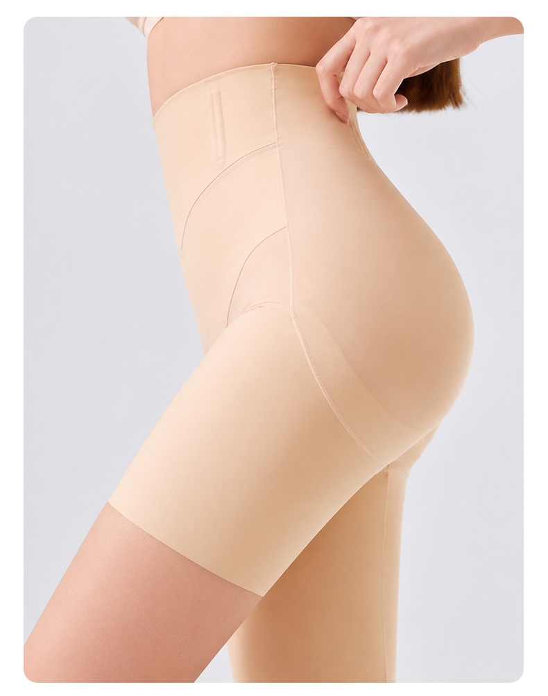 Side view of model wearing beige high waist shaping shorts VEIMIA