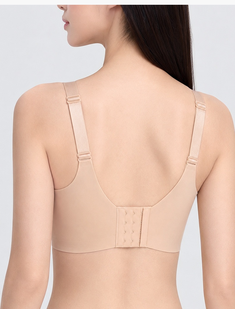 Model wearing sand bra back view with deep U-back and hook closure VEIMIA