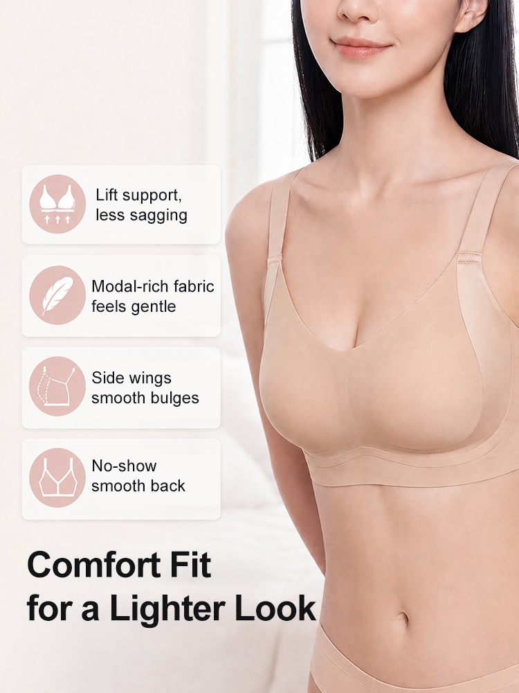 Model wearing sand bra with lift support side wings and smooth back VEIMIA