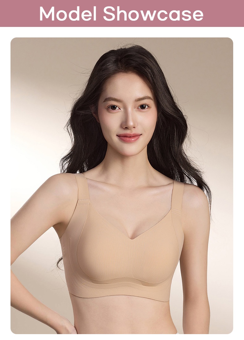 Model wearing beige molded cup supportive bra front view against a neutral background VEIMIA