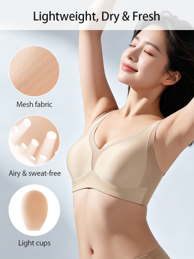 Model wearing beige wireless bra with mesh fabric and light cups VEIMIA