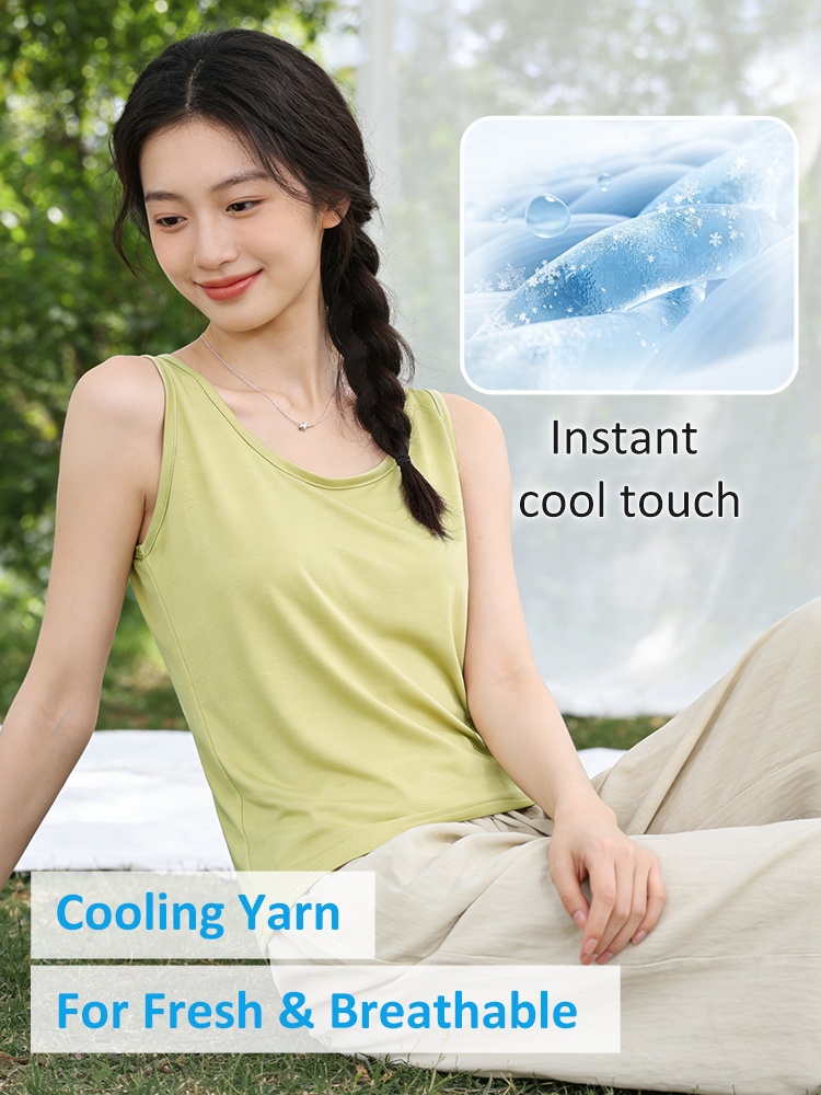 Green loose tank top with cooling yarn and fresh breathable fabric on model - VEIMIA
