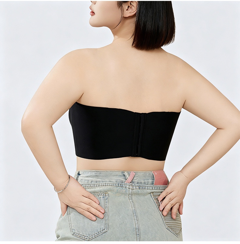 Back view of model wearing black strapless bra with hook closure VEIMIA