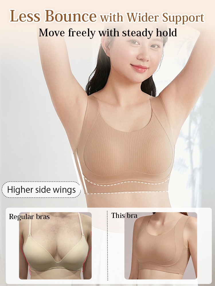 Model wearing sand seamless bra with higher side wings for steady support VEIMIA