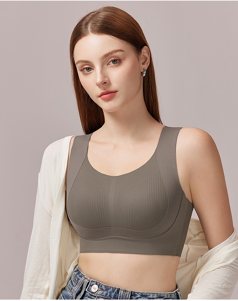 Model wearing gray seamless bra in front view with ribbed cups VEIMIA
