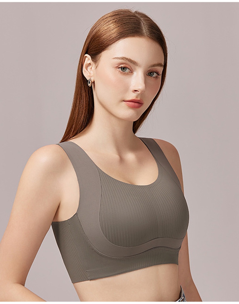 Model wearing gray seamless bra in three-quarter front view VEIMIA