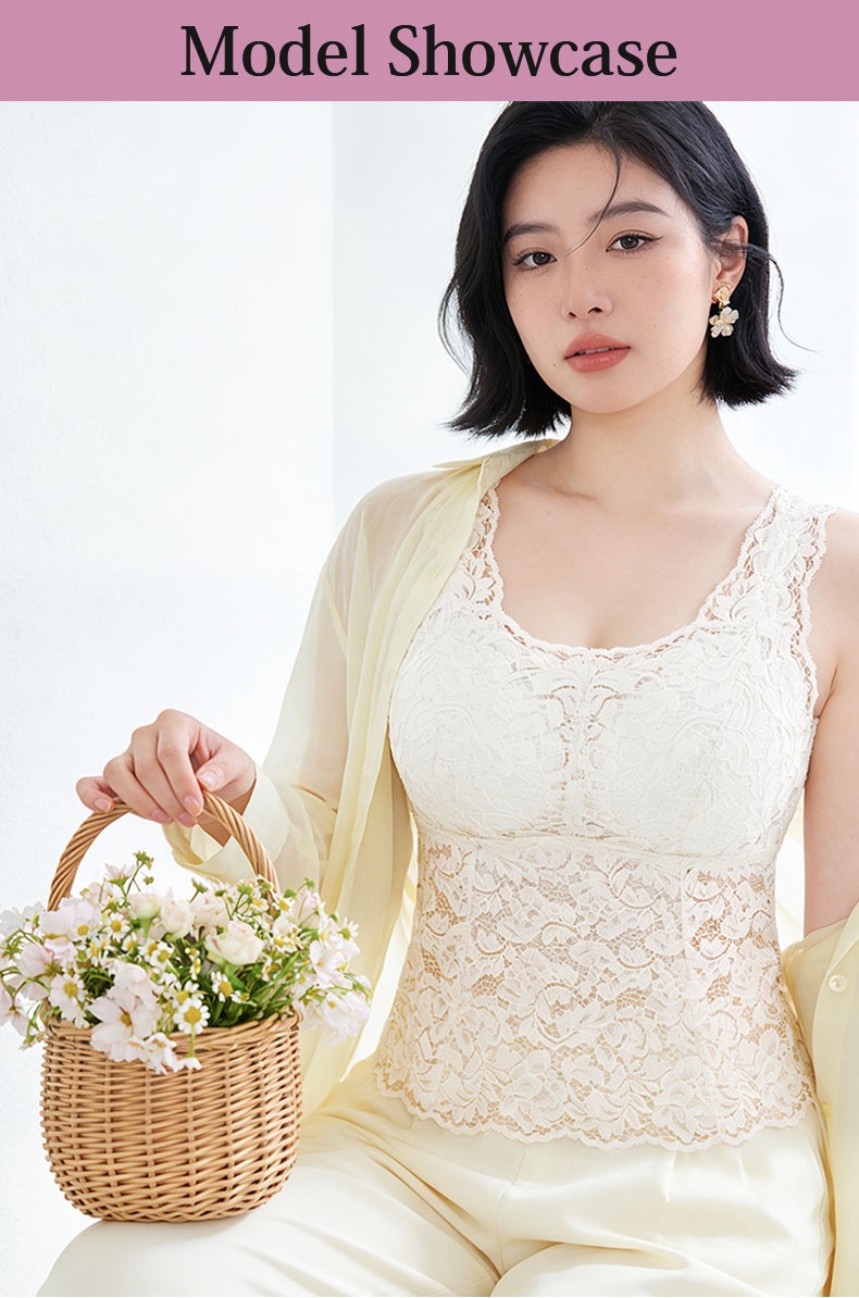 Model wearing white lace tank top with basket accessory VEIMIA