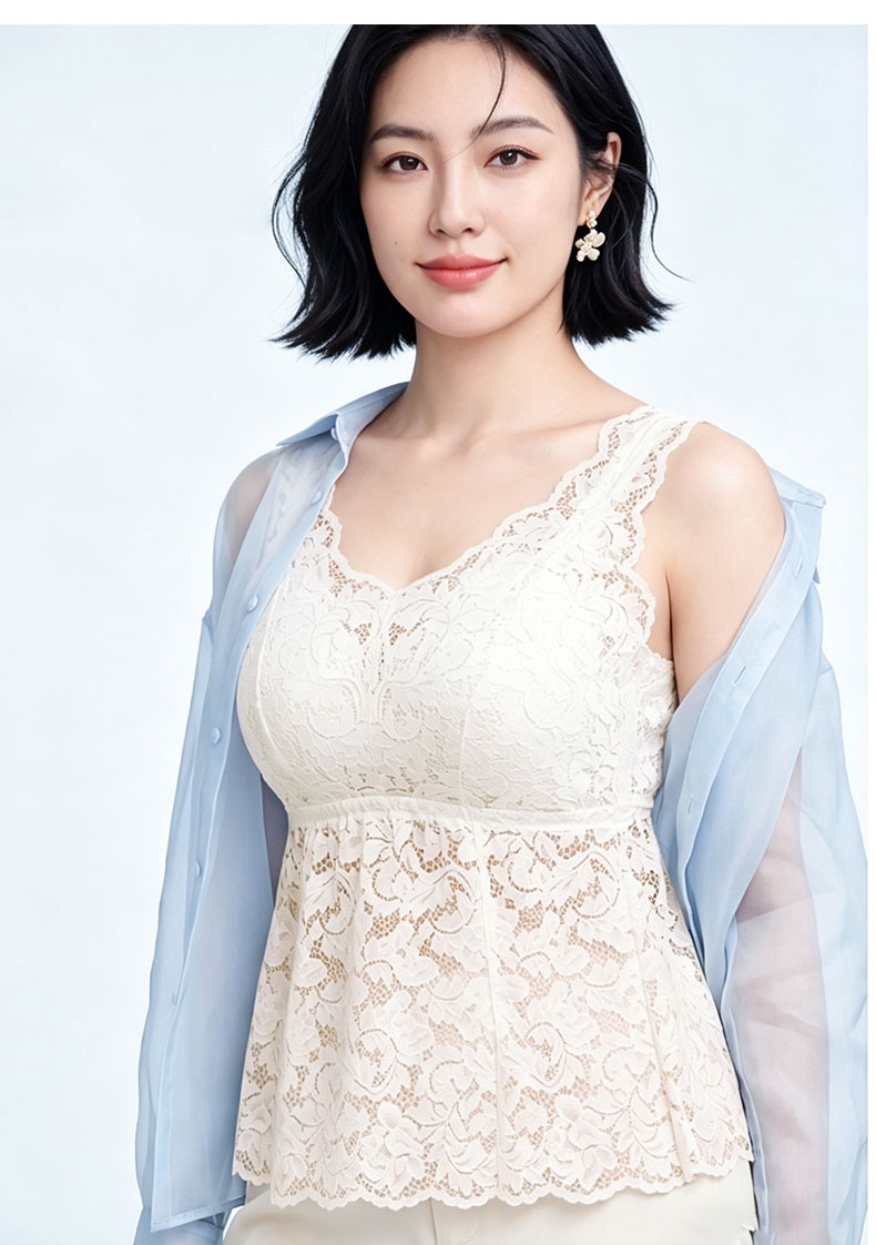 Model wearing white lace tank top with light blue outer layer VEIMIA