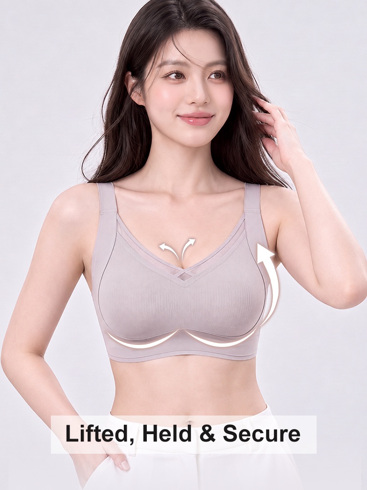 Model wearing purple V neck wireless bra with illustrated upward cup support VEIMIA
