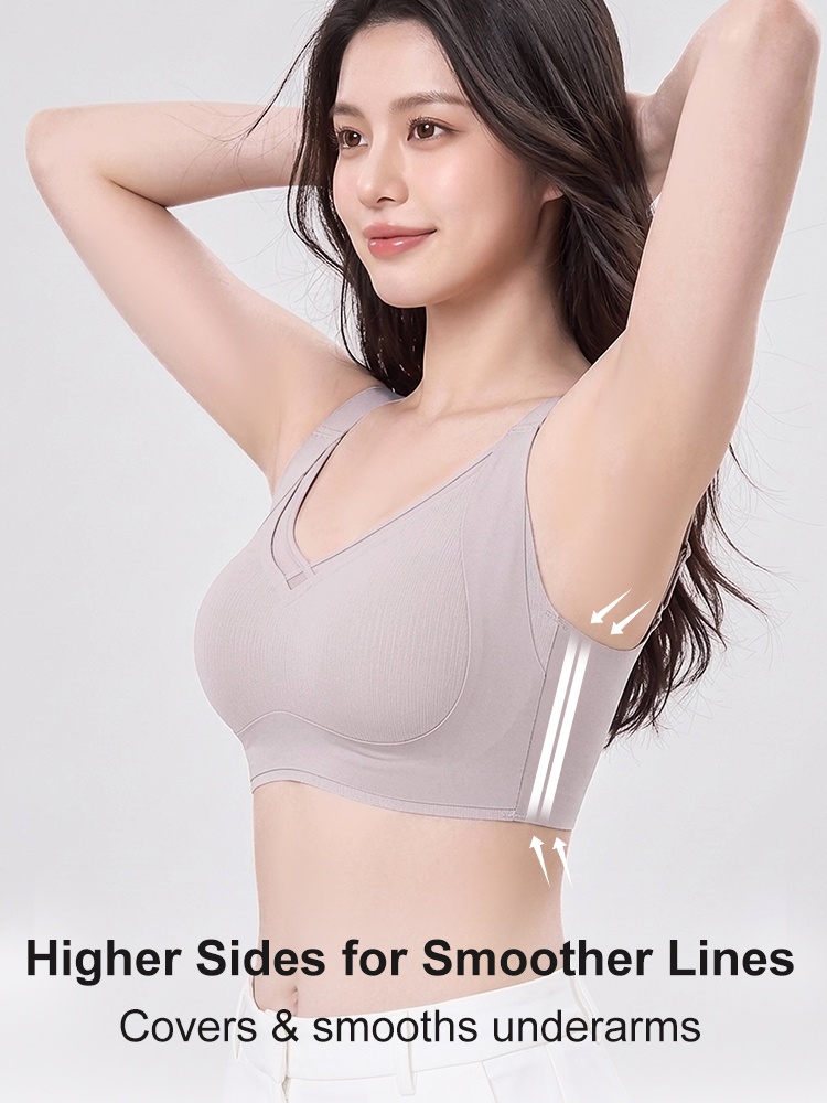 Side view of model wearing purple bra with high underarm coverage panels VEIMIA