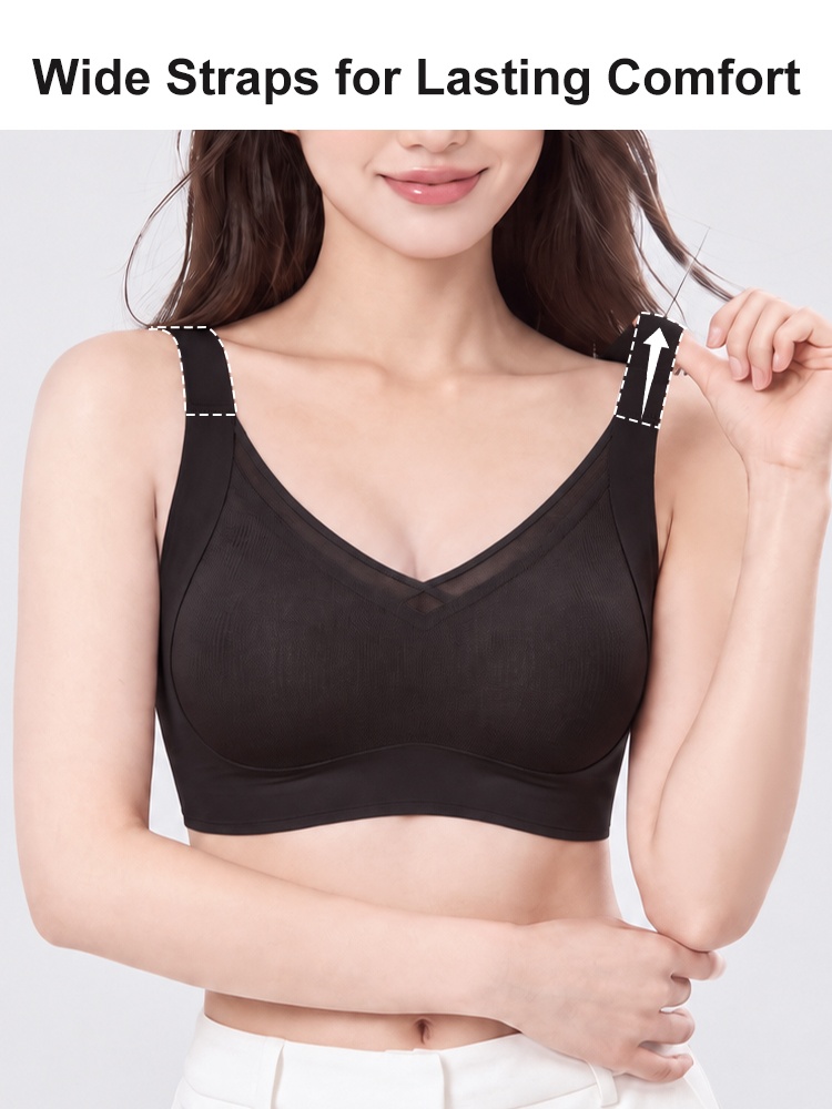 Front view of model wearing black wireless bra with wide shoulder straps VEIMIA
