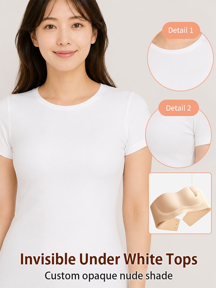 Model wearing white top showing invisible nude strapless bra under light clothing VEIMIA