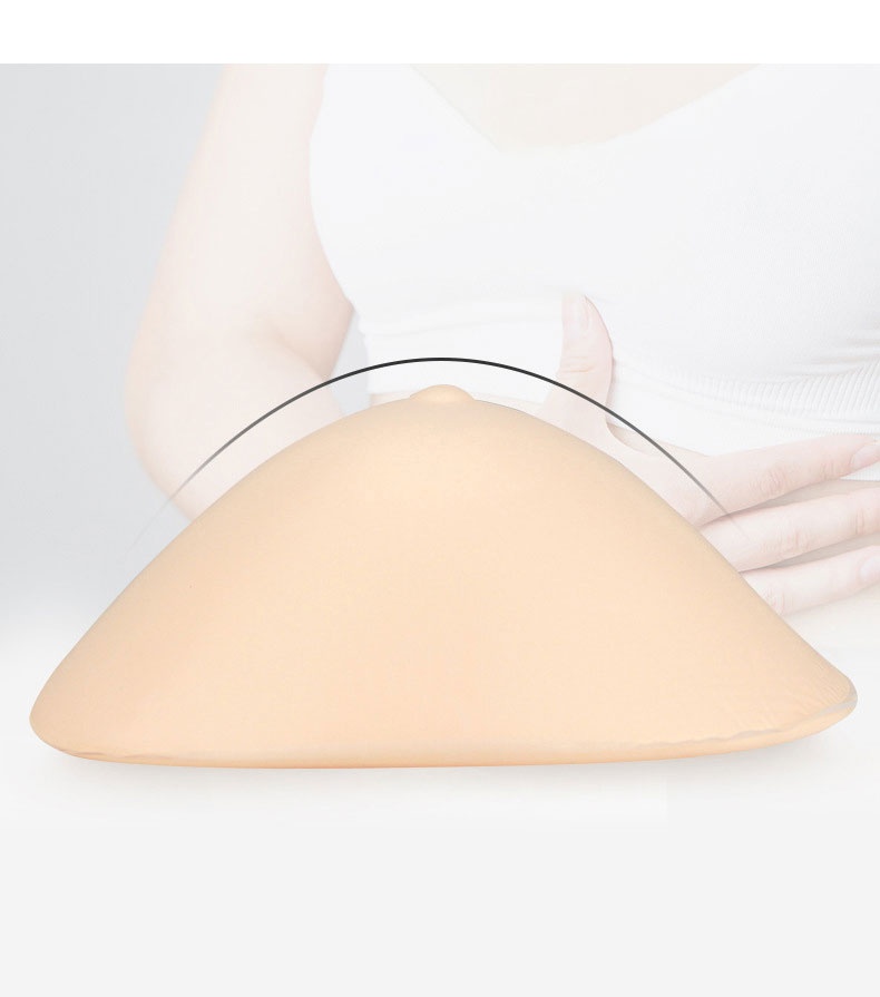 乳房假體的側面視圖，顯示其弧形輪廓 VEIMIA