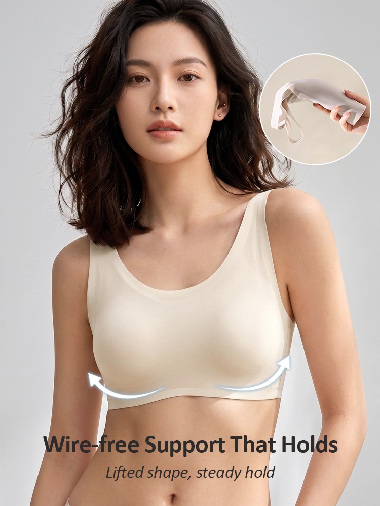 Model wearing white seamless wireless bra with curved underbust support graphic VEIMIA