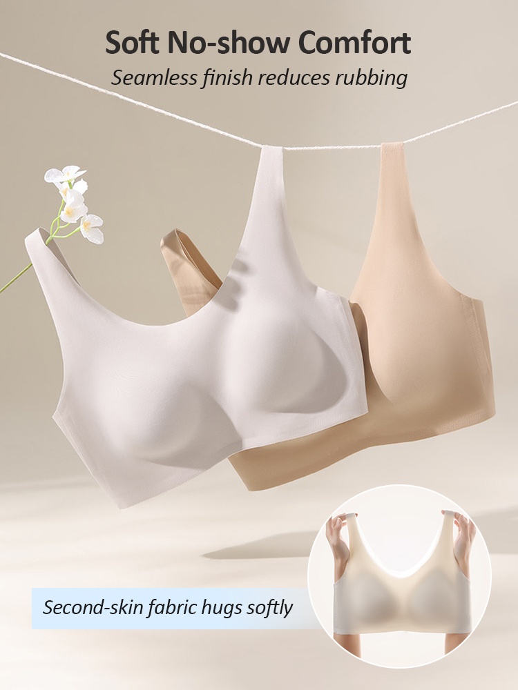 White and beige seamless bras displayed with soft no-show fabric demonstration VEIMIA