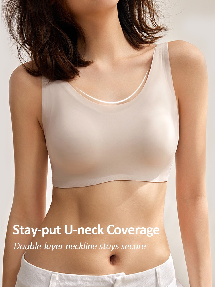 Model wearing white seamless bra front view with wide U-neckline VEIMIA