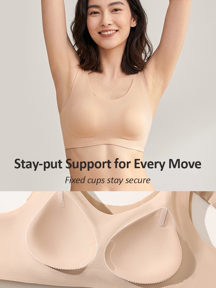 Model wearing beige seamless bra with fixed cup support detail VEIMIA