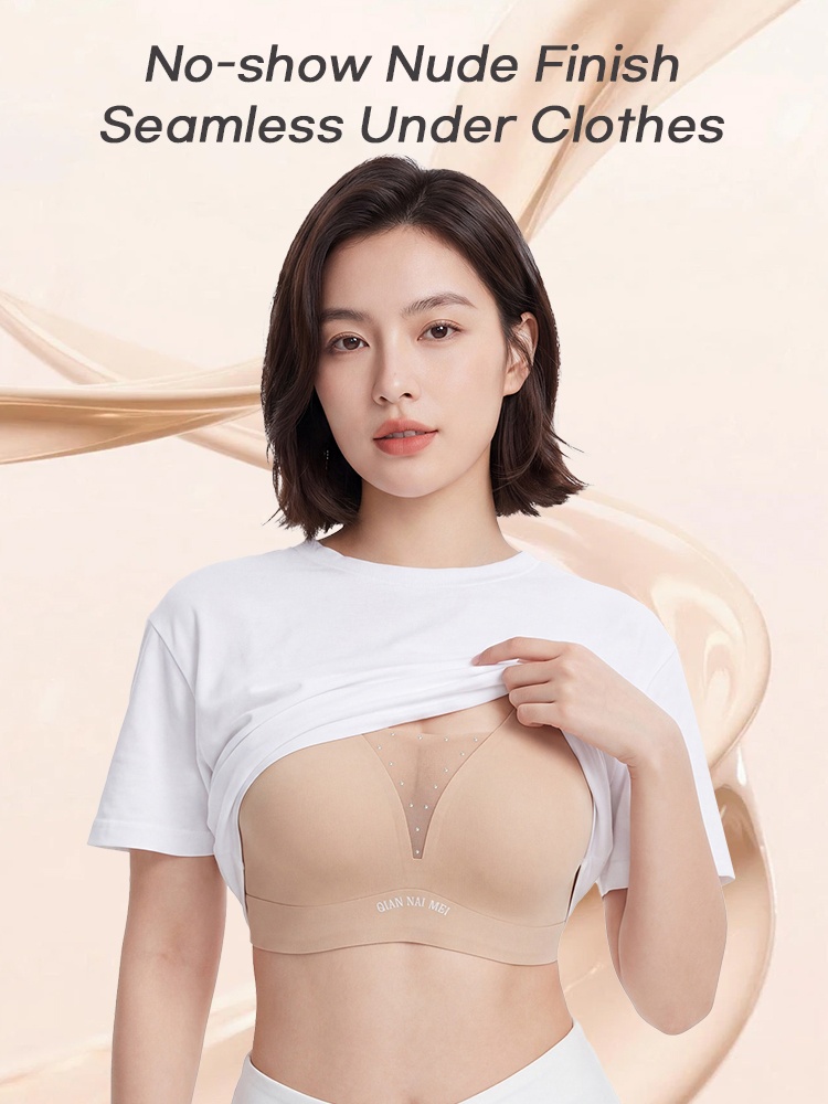 Model wearing beige seamless bra under white T-shirt for no-show finish VEIMIA