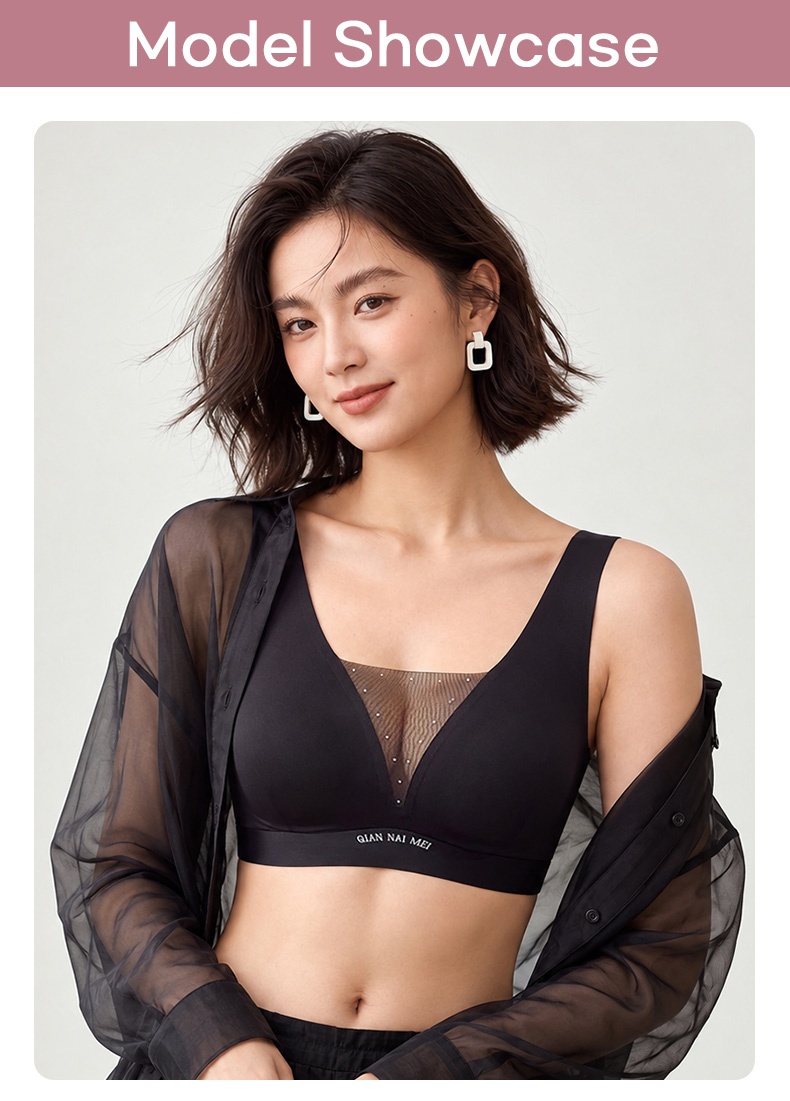 Model wearing black bra with wide straps and sheer mesh neckline VEIMIA