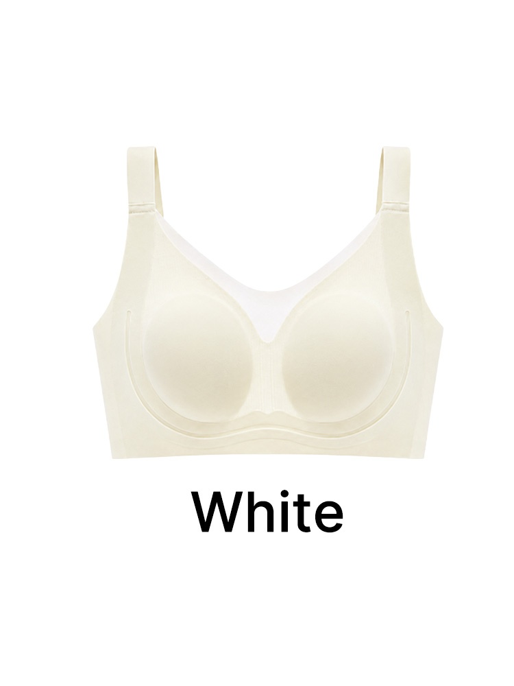 White seamless minimizer bra front view with wide straps and mesh neckline VEIMIA