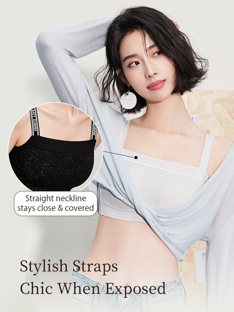 Model wearing white bra with straight neckline and visible straps under top VEIMIA